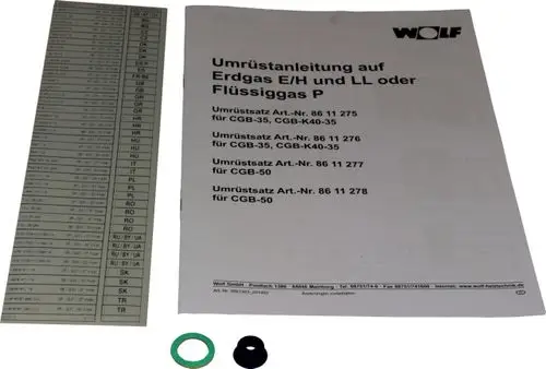 Umbausatz von Wolf für die Umrüstung auf Erdgas E/LL oder Flüssiggas, bestehend aus Anleitung, Schablone und zwei Dichtungen.